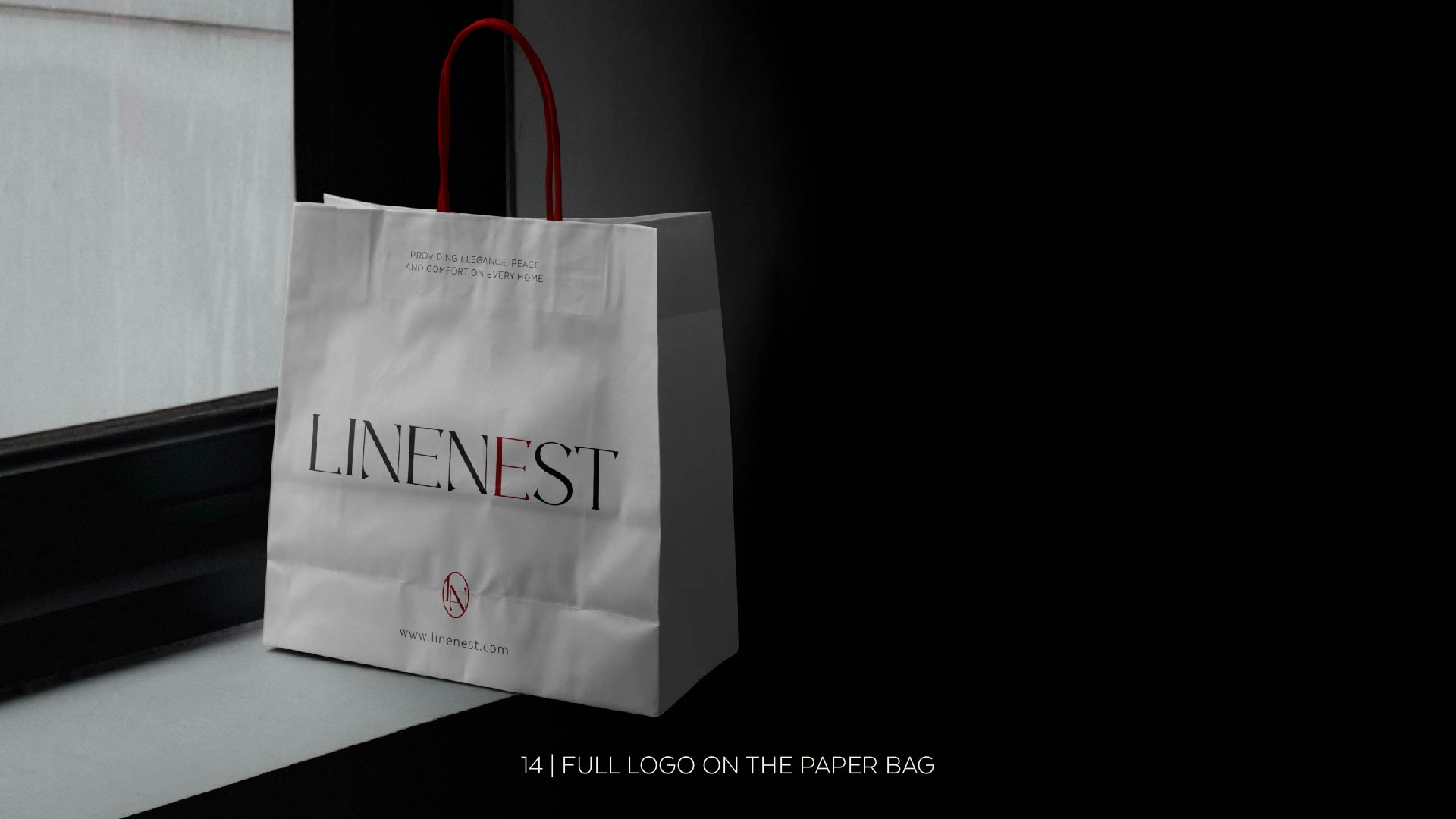 Linenest paper shopping bag with logo and red handles