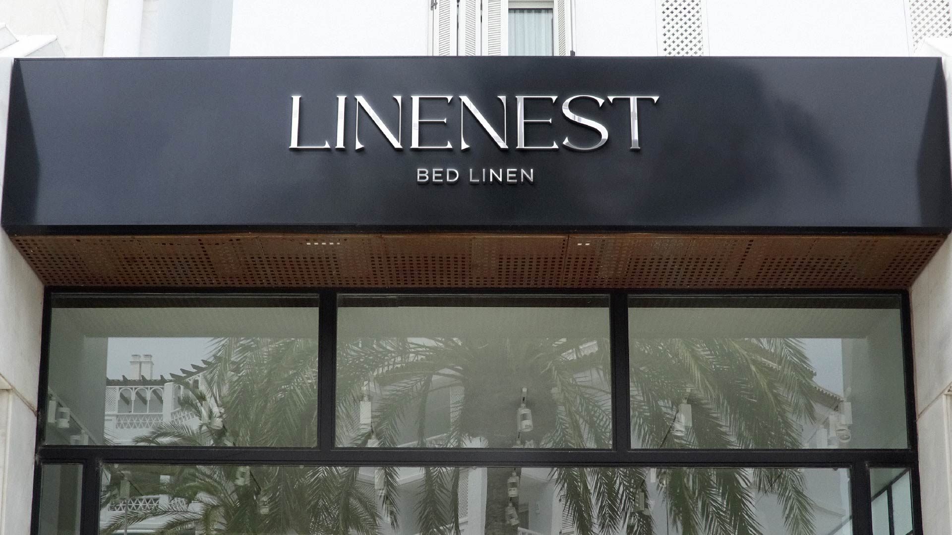 Linenest storefront with branded signage